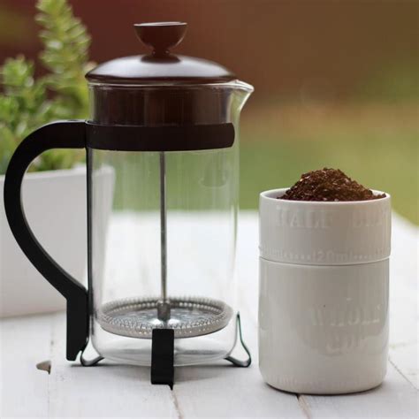 french press brewing coffee.